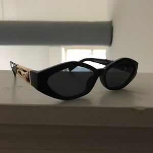 Gorgeous angular oval slim sunglasses